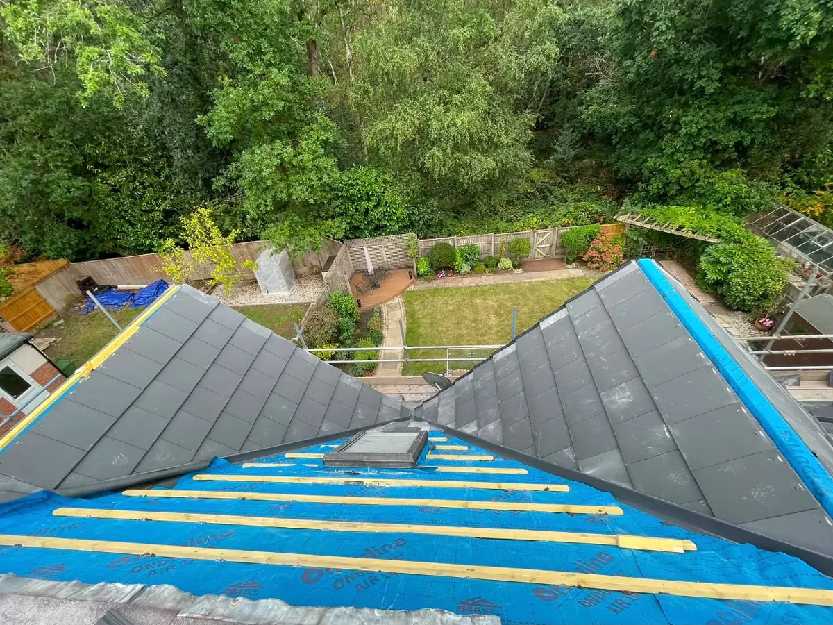 1. Strip and new membrane – re-roof by Stratton Roofing